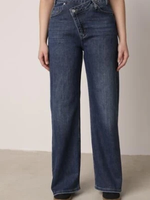 Niebieskie Bawełniane Jeansy o Szerokim Kroju z Asymetrycznym Zapięciem Fezitera