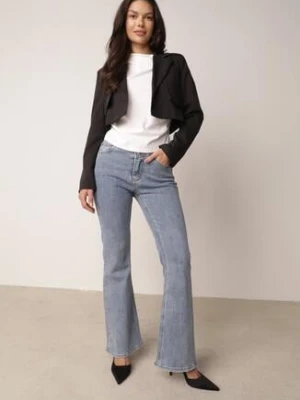 Niebieskie Jeansy Dzwony z Bawełną Zapinane na Podwójny Guzik Daphlea milas91