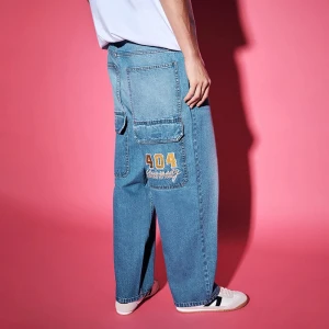 Niebieskie jeansy skater baggy fit z kieszeniami i haftem House