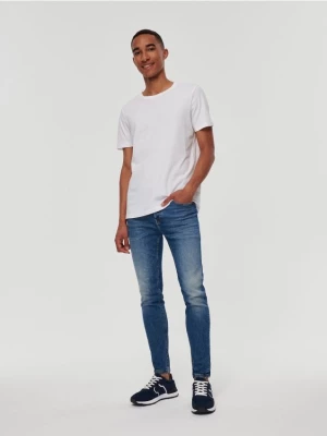 Niebieskie jeansy skinny fit House