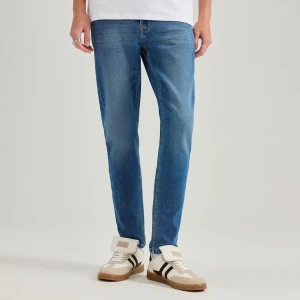 Niebieskie jeansy slim fit z przetarciami House