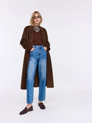 Niebieskie przecierane spodnie jeansowe z przeszyciami TARANKO