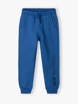 Niebieskie spodnie dresowe dla chłopca - New Generation Lincoln & Sharks by 5.10.15.