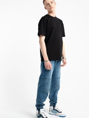 Niebieskie spodnie jeansowe typu joggery z modnymi przeszyciami Reporter Young