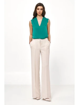 Nife Spodnie w kolorze beżowym rozmiar: 38