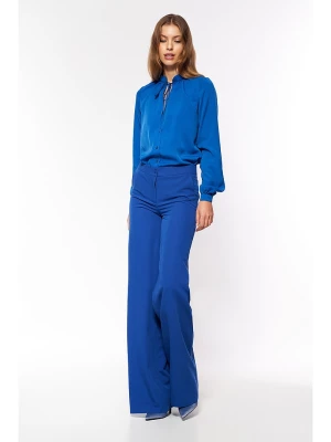 Nife Spodnie w kolorze niebieskim rozmiar: 40