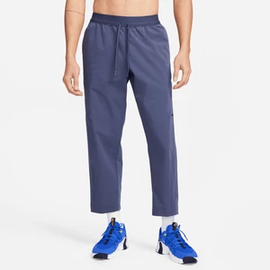 Nike A.P.S. Męskie uniwersalne spodnie z tkaniny Dri-FIT - Niebieski