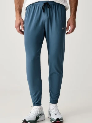 Nike spodnie dresowe męskie Stride Dri-FIT niebieski