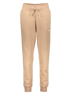 Nike Spodnie dresowe "Phoenix" w kolorze beżowym rozmiar: S