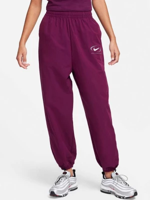 Nike Spodnie dresowe w kolorze fioletowym rozmiar: L
