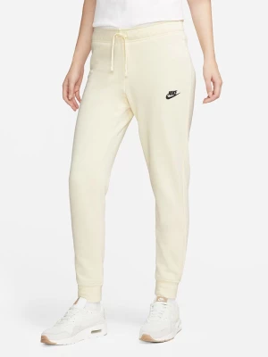 Nike Spodnie dresowe w kolorze kremowym rozmiar: M