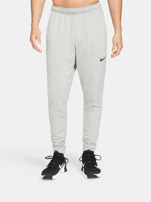 Nike Spodnie dresowe w kolorze szarym rozmiar: M