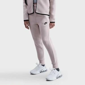 Nike Sportswear Tech Fleece uniseks Spodnie dresowe różowy rozmiar Odzież
