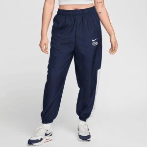 Nike Sportswear Woven Joggers kobiety Spodnie dresowe niebieski rozmiar Odzież