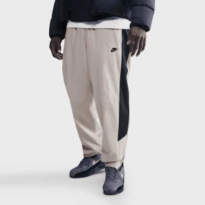 Nike Windrunner Lined Pant mężczyźni Spodnie dresowe beż rozmiar Odzież
