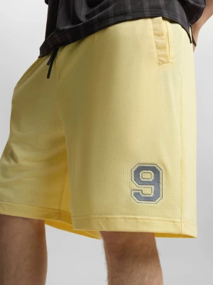 Nine krótkie spodenki regular męskie żółte Klasyk
