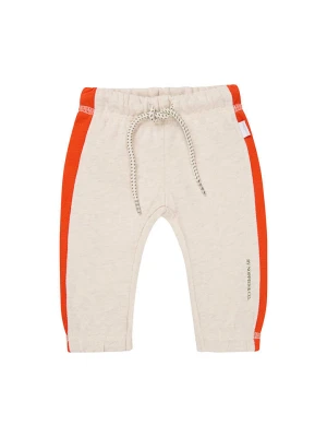 Noppies Spodnie dresowe "Oliver" w kolorze kremowym rozmiar: 86