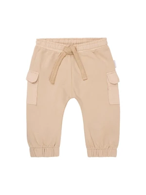 Noppies Spodnie dresowe "Orion" w kolorze beżowym rozmiar: 86