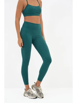 Onamaste Legginsy sportowe "Geneva" w kolorze turkusowym rozmiar: L/XL