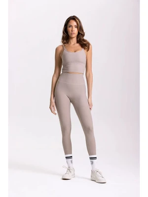 Onamaste Legginsy sportowe "Lotus" w kolorze szarobrązowym rozmiar: S/M