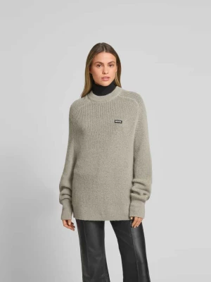 Oversize’owy sweter z wełny o dzianinowym wyglądzie ROTATE Średnioszary