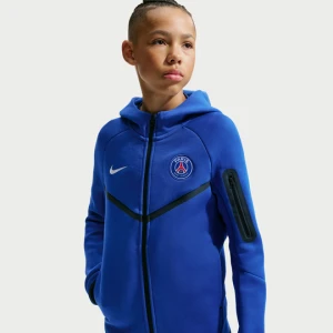 Piłkarska bluza z kapturem i zamkiem na całej długości dla dużych dzieci (chłopców) Nike Paris Saint-Germain Tech Fleece - Niebieski