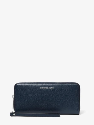 Podróżna torebka na nadgarstek Jet Set z groszkowanej skóry Michael Kors GRANATOWY (Niebieski)
