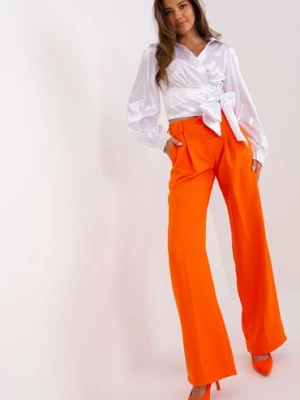 Pomarańczowe garniturowe spodnie z kieszeniami Lakerta