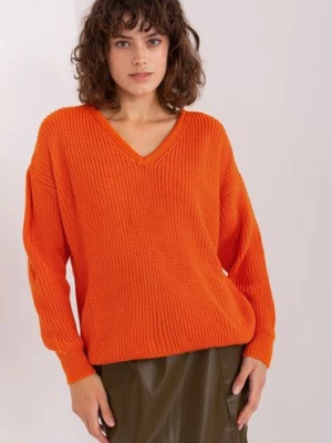 Pomarańczowy sweter damski o kroju oversize