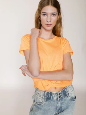Pomarańczowy t-shirt dla dziewczyny z marszczonym dołem Reporter Young