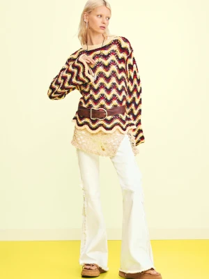 Postrzępione dżinsowe spodnie z rozszerzanymi nogawkami Desigual