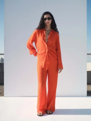 Proste spodnie z efektem marszczenia pomarańczowy - Kobieta - - MANGO