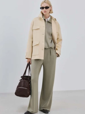 Proste spodnie z elastycznym pasem khaki - Kobieta - - MANGO