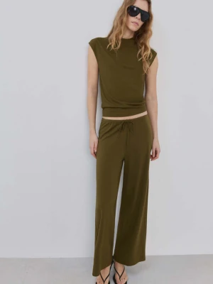 Proste spodnie z elastycznym pasem khaki - Kobieta - - MANGO