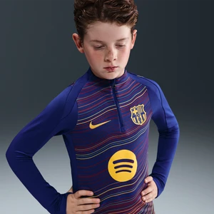 Przedmeczowa treningowa koszulka piłkarska dla dużych dzieci Nike Dri-FIT FC Barcelona Strike (wersja domowa) - Niebieski