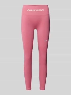 Przylegające legginsy sportowe z nadruk z logo Nike Mocnoróżowy