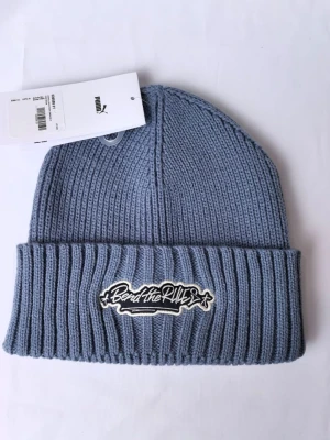 Puma Czapka beanie w kolorze błękitnym rozmiar: onesize