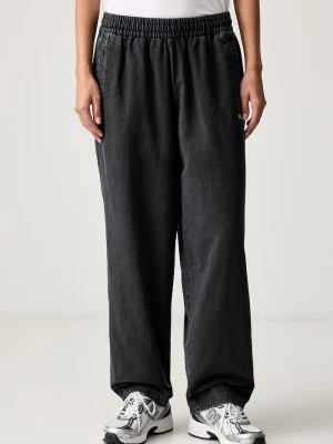 Puma jeansy relaxed fit damskie FUTURE ARCHIVE szary