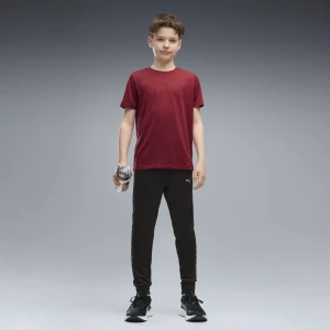 PUMA Młodzieżowe dopasowane spodnie Train All Day Essentials z nadrukiem, Odzież, Czarny