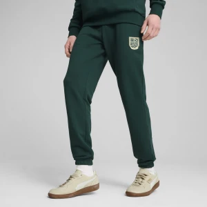 PUMA Męskie spodnie dresowe z grafiką SPORTS LEGACY, Akcesoria, Zielony,