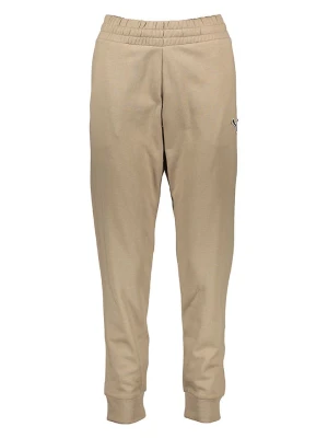 Puma Spodnie dresowe "Better Essentials" w kolorze beżowym rozmiar: S