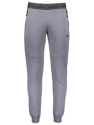 Puma Spodnie dresowe "C- PMA Pumatech" w kolorze szarym rozmiar: XL