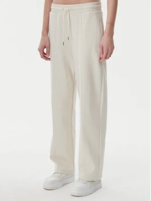 Puma Spodnie dresowe Ess 629774 Beżowy Straight Fit