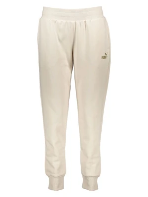 Puma Spodnie dresowe "Essentials+" w kolorze beżowym rozmiar: XL