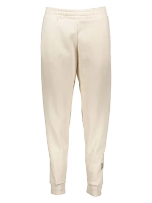 Puma Spodnie dresowe "Essentials+" w kolorze beżowym rozmiar: L