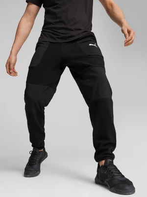 Puma Spodnie dresowe "Fit Hybrid" w kolorze czarnym rozmiar: L