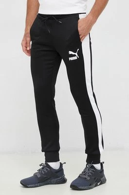 Puma spodnie dresowe kolor czarny wzorzyste 530098-01