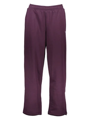 Puma Spodnie dresowe "Motion" w kolorze fioletowym rozmiar: L