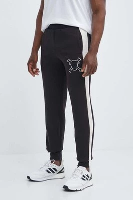 Puma spodnie dresowe PUMA X ONE PIECE kolor czarny wzorzyste 624671