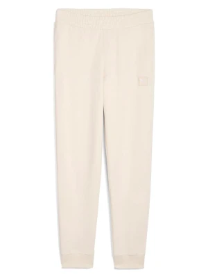Puma Spodnie dresowe w kolorze kremowym rozmiar: XS